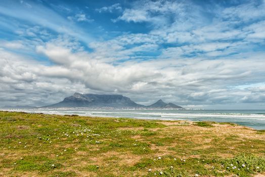 The Cape Town Central Business District and Table Mountain as seen across Table Bay from Dolphin Beach in Bloubergstrand