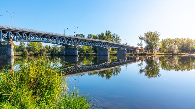 Tyrs Bridge over Labe River in Litomerice on sunny summer day, Czech Republic.