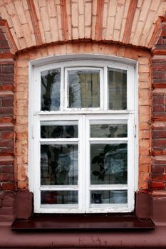 Old house red brick wall with nice window