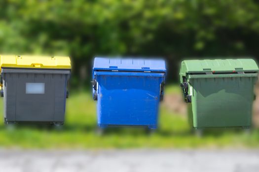 Industrial Waste Containers Dumpster for municipal and private waste or industria. Background with blur