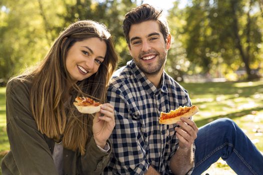 Friends at the park making a picnic