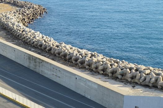 View of the stone and concrete breakwaters along the pier, the port of Civitavecchia, on 7 October 2018.