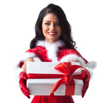 Woman in red Santa Claus outfit giving christmas gift box