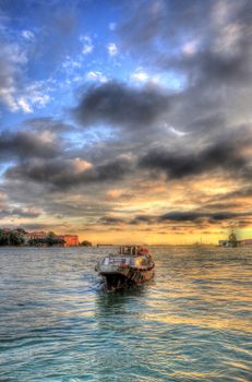 Beautiful sunset with a ship in the Mediterranean sea, Venice, Italy HDR 