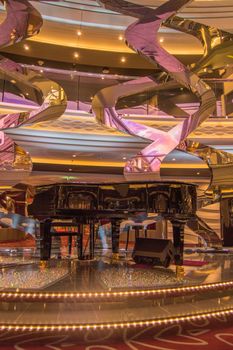 Luxury sparkling interior with Grand piano and floor with rhinestones on cruise liner MSC Meraviglia, 8 October 2018.