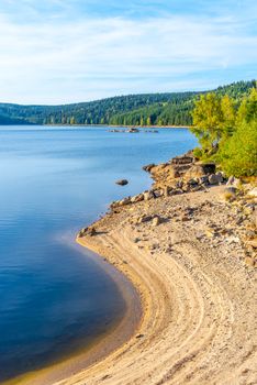 Mountain water reservoir Josefuv Dul, aka Josefodolska Dam, Jizera Mountains, Czech Republic. Sunny summer day.