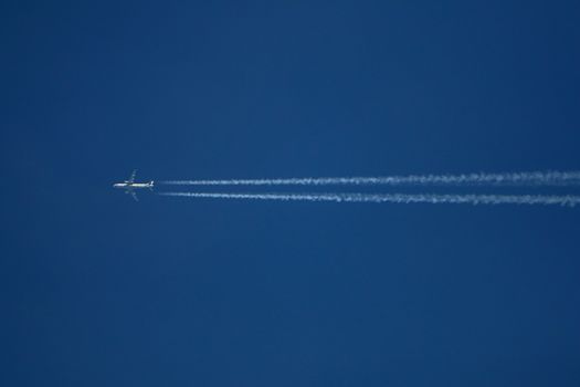 Trace of the airplane in the sky.