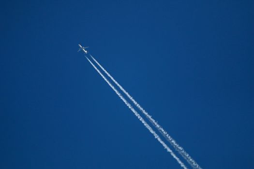 Trace of the airplane in the sky.