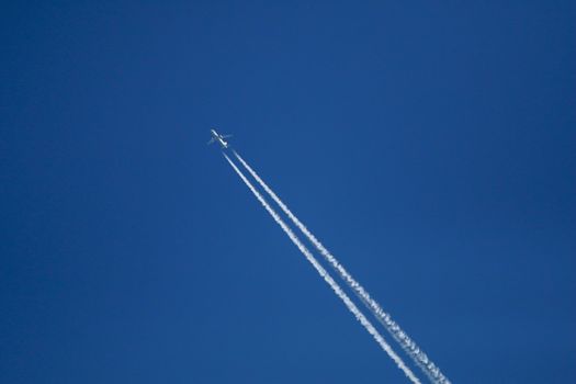 Trace of the airplane in the sky.