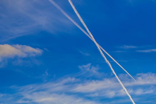 Trace of the airplane in the sky.