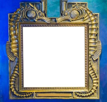 empty golden painting or mirror frame decorated with seahorse animals to put what ever you want on the empty white space