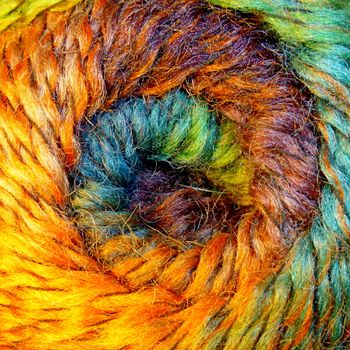 Skein of wool yarn. Macro shooting. Texture of wavy thread. Background image. Hobbies leisure crafts