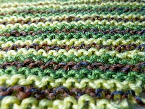 Knitted fabric. Knitting texture. Macro shooting. Background image. Hobbies leisure crafts