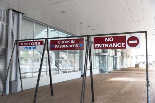 entrance to the cruise terminal in rotterdam with the shields no entrance visitors crew and check in passengers