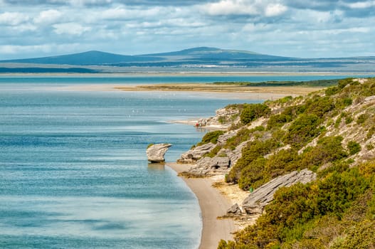View of the Langebaan Lagoon on the Atlantic Ocean coast in the Western Cape Province. The Preekstoel (pulpit) rock formation is visible