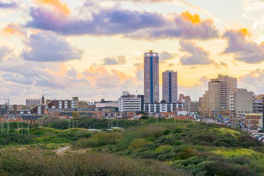 View on the city with skyscrapers from the dunes of Scheveningen a touristic and popular city near the beach in Holland