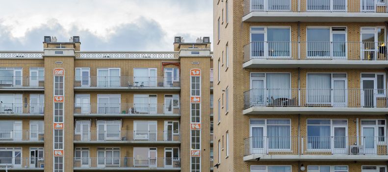 yellow apartments flat with balcony's exterior architecture housing in the city