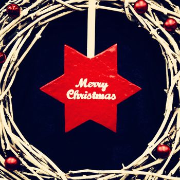 christmas wreath with big red star. photo