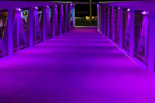 modern city architecture a bridge with purple neon lights in scheveningen the netherlands a urban cityscape scenery