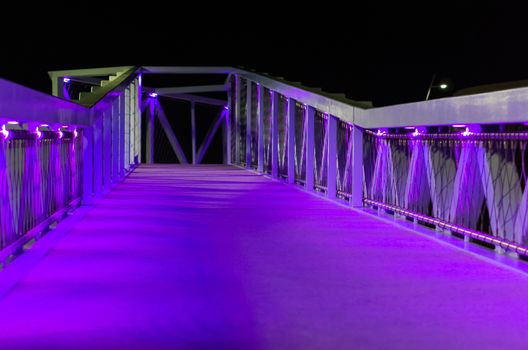 beautiful city bridge with purple and blue lights modern city architecture in scheveningen the netherlands urban city scenery