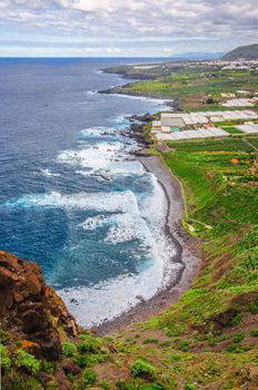 Ocean shore with waves in Tenerife, Canary Islands.