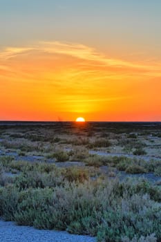 Beautiful sunset on salt lake Chott el Djerid, Sahara desert, Tunisia, Africa, HDR