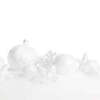 Christmas card with beautiful white decorations in snow