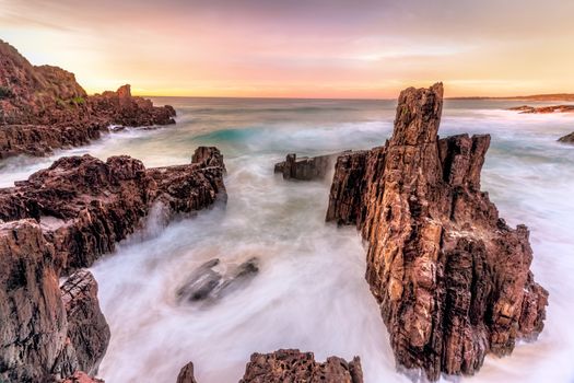 Ocean flows around sea stacks like a moat.  Sitting in my castle and from its tower  watching the sunrise