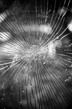 Broken and cracked glass, detail of vandalism and violence