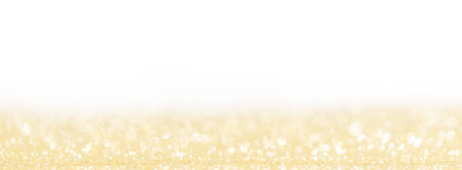 Abstract shining glitters golden on white holiday bokeh background with copy space for text