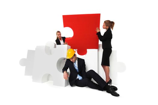 Coworkers look at tired foreman sleeping near puzzle isolated on white background