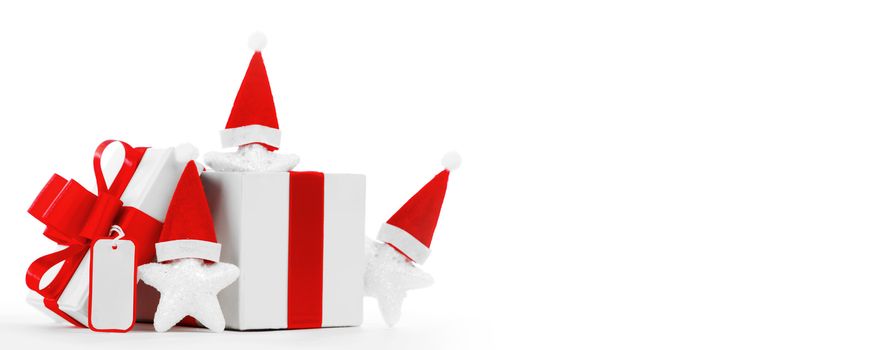 Christmas present with santa claus hat isolated on white background