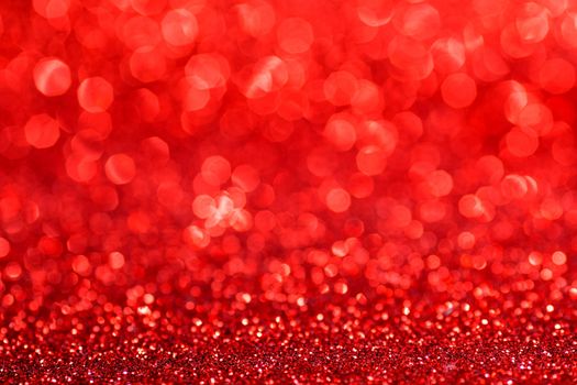 Red twinkling lights abstract holiday background with copy space