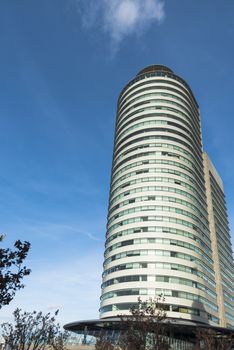 modern high buildings on the south point of rotterdam with blue sky background