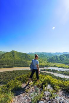 Woman in Altai mountain, beauty summer landcape