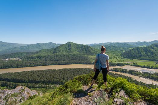 Woman in Altai mountain, beauty summer landcape