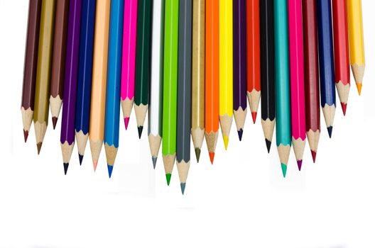 Colour pencils isolated on white background close up