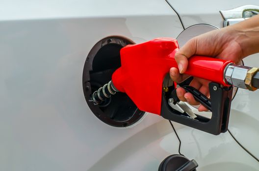 Fuel nozzle add fuel in car