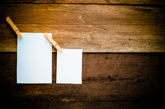 paper note on wooden background