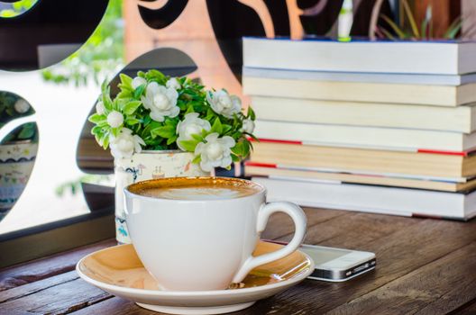 Cup of coffee on a wooden table