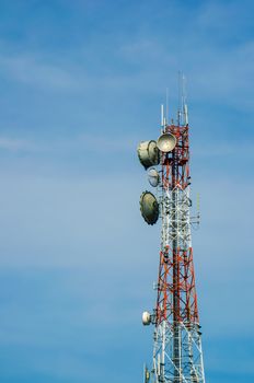 mobile antenna tower against blue sky background