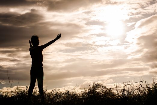 Shadow of a girl showing signs glad to see the sun, sky, nature