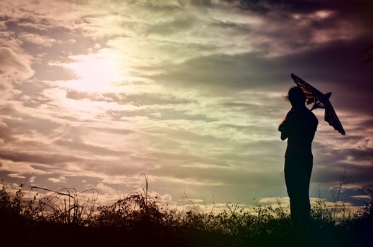 Shadow of a girl showing signs glad to see the sun, sky, nature