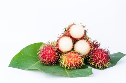 Thailand red rambutan fruit is sweet on a white background.