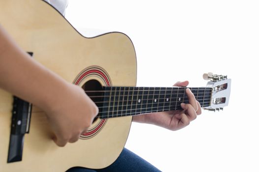 Girl playing guitar - Focus hand.