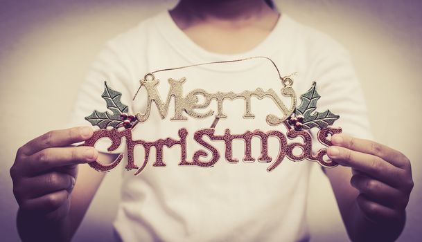 Merry Christmas In the hands of a girl