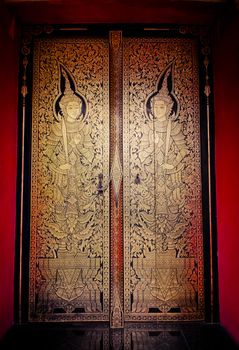 Thai pattern on door in Thailand Buddha Temple Asian style art