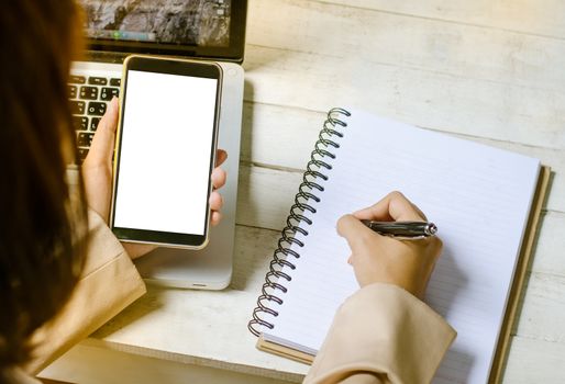 Young manager working with notebook in the office