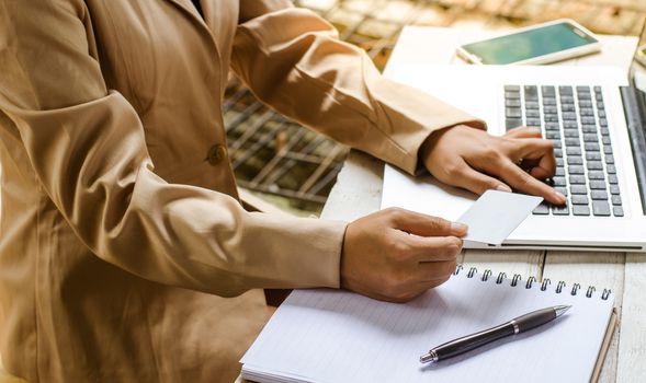 Young manager working with notebook in the office