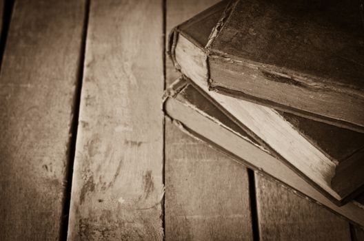 Old books on the wooden floor